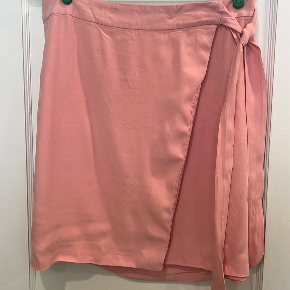 Loft wrap front skirt with tie at side and lined on the inside.